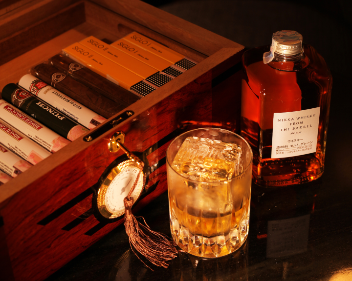 Japanese whisky and cigar display at Aouku cocktail bar Bali