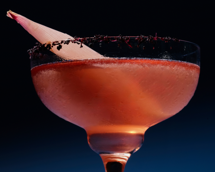 Red signature cocktail with garnish at Aouku Japanese cocktail bar Bali