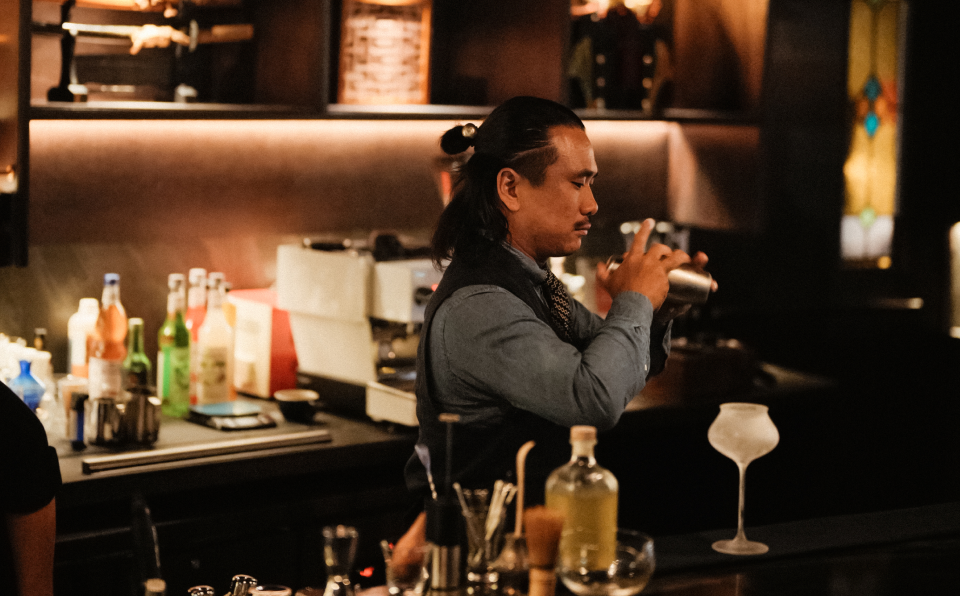 Bartender mixing cocktail at Aouku Japanese cocktail bar in Bali